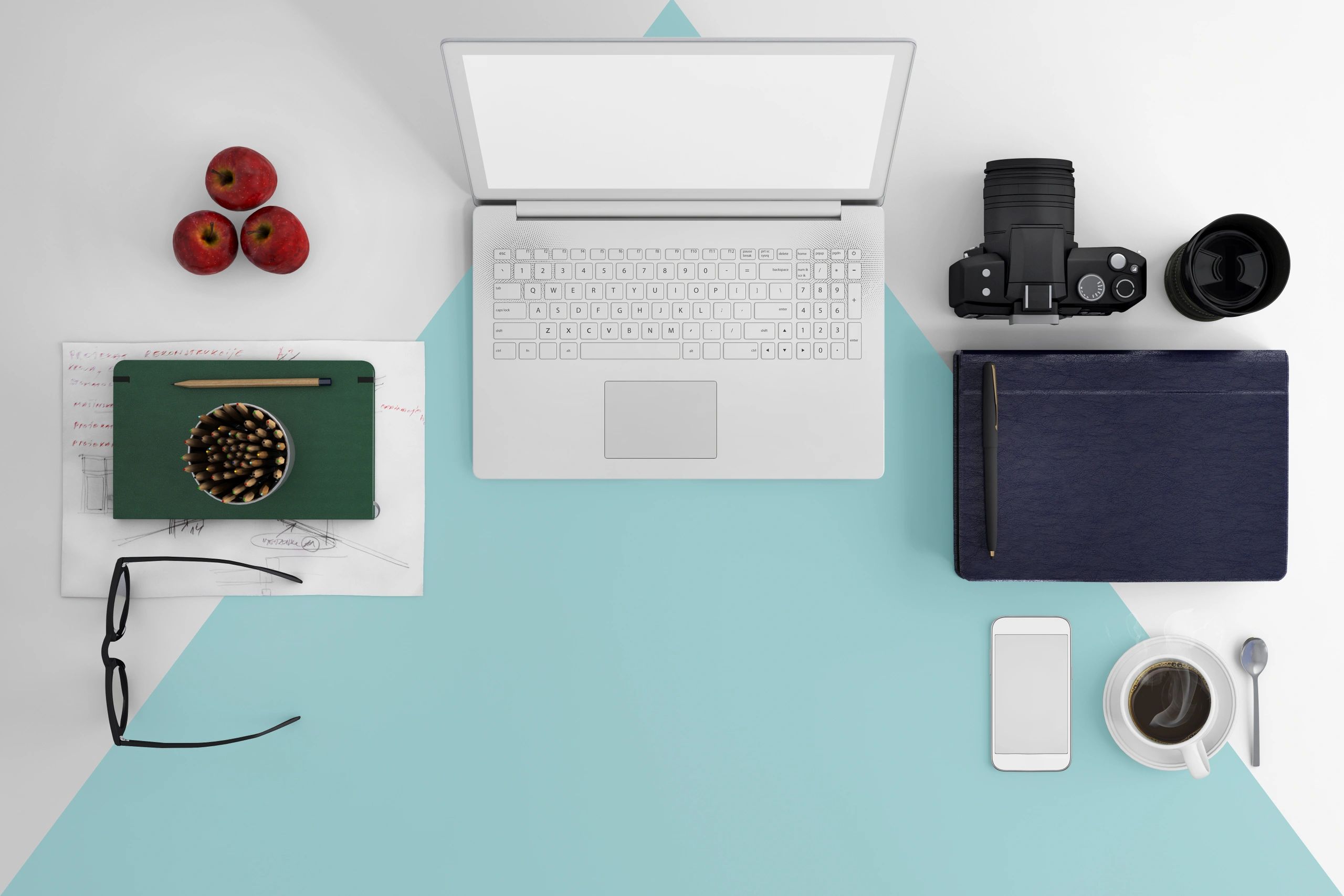 Organized desk with laptop and planning tools, representing template-based systems